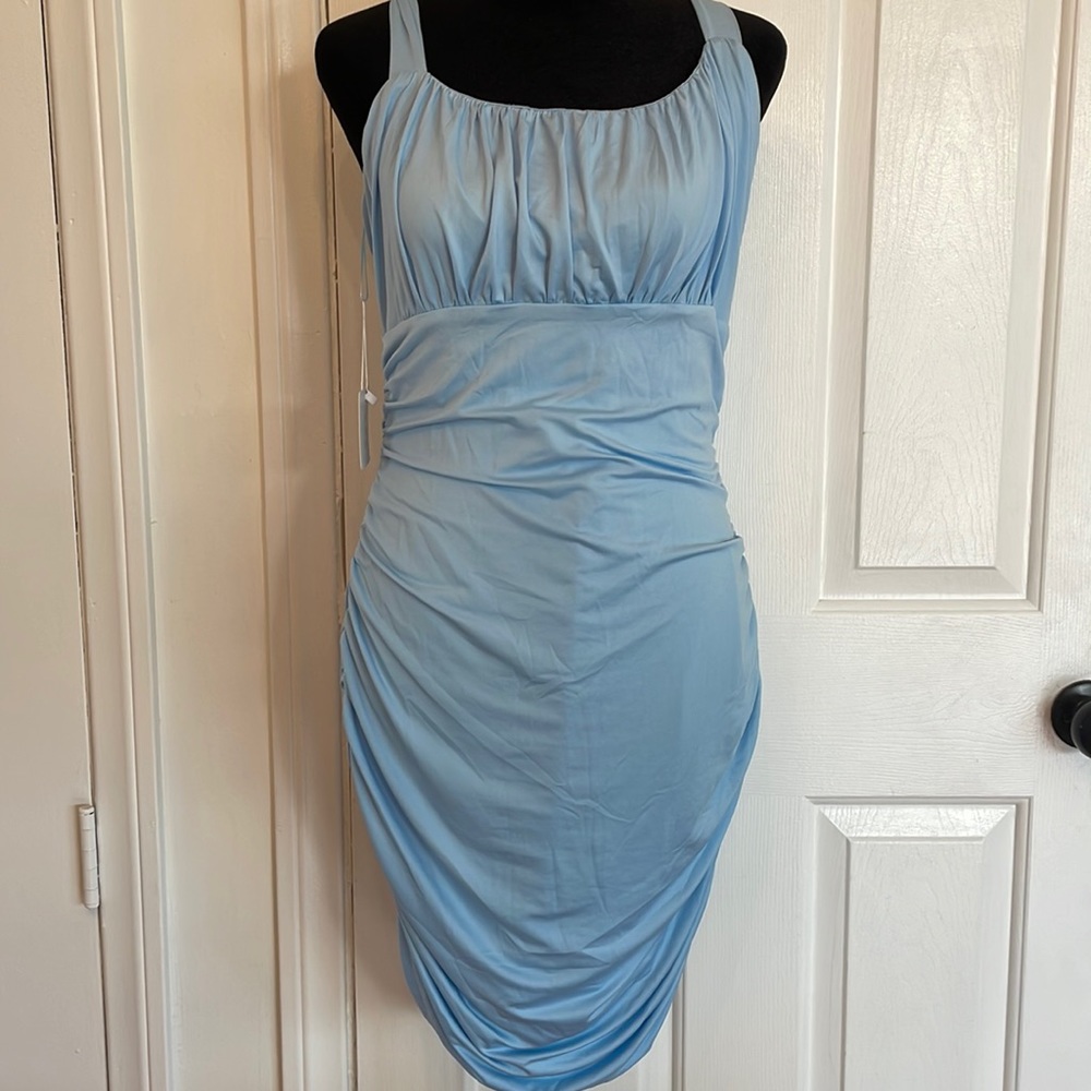 Yissang dress w/tags. Never worn. Beautiful light blue. Sz-L. W/ruching & tie